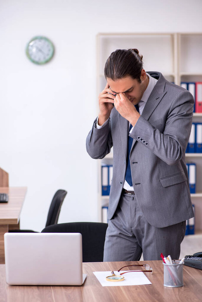Unhappy male businessman in the office - Photo, Image