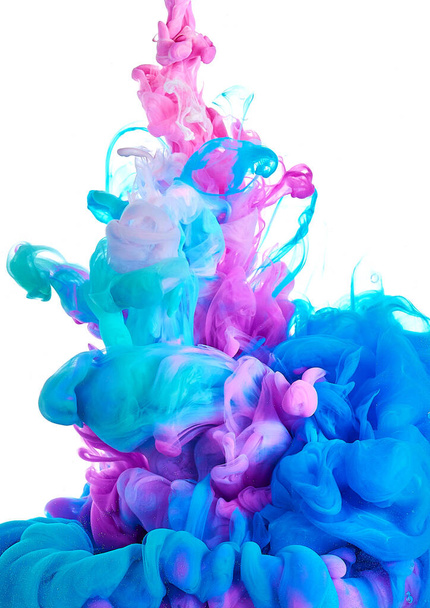 Ink in water. Splash paint mixing. Multicolored liquid dye. Abstract background color - Photo, Image