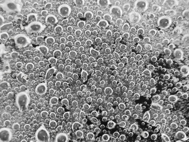 Абстрактне розмивання. бульбашки на нижній поверхні сковороди з киплячою водою Розмитий фон
 - Фото, зображення