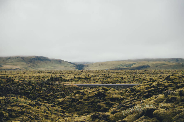 Road through moss lava field (south Iceland). - Fotografie, Obrázek