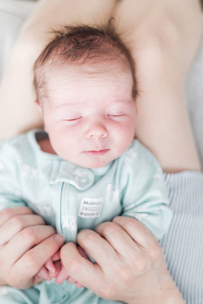Lifestyle portrait of a newborn, three weeks old baby girl. - Zdjęcie, obraz