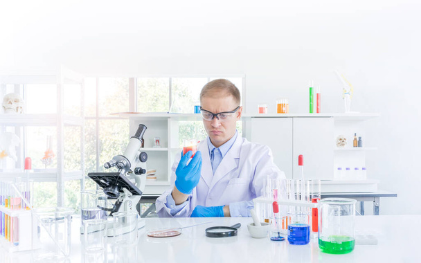 Scientist working or research for some confidential in chemical laboratory, Science and healthy or medical concept - Fotoğraf, Görsel