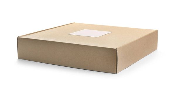 One closed cardboard box isolated on white - Photo, image