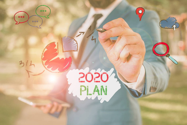 Escritura manual conceptual que muestra el Plan 2020. Texto fotográfico empresarial que establece sus objetivos y planes para el año en curso o en 2020
. - Foto, Imagen