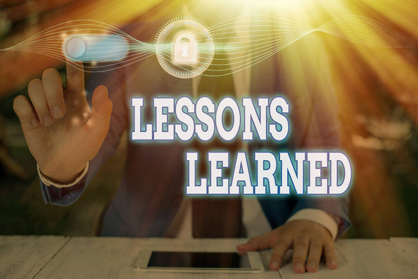 Conceptual hand writing showing Lessons Learned. Business photo text the knowledge or understanding gained by experience. - Photo, Image