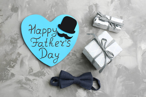 Flat lay composition with greeting card on light grey stone background. Happy Father's Day - Foto, imagen