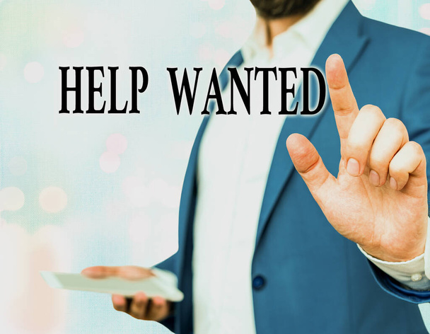 Word writing text Help Wanted. Business concept for An ad in the paper an employer places to find a new employee. - 写真・画像