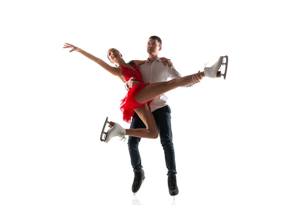 Duo figure skating isolated on white studio backgound with copyspace - Foto, imagen
