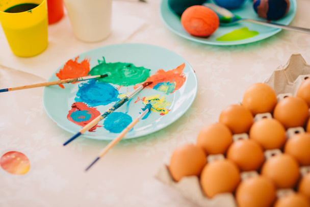 Family Easter Decoration Painting Eggs Mom with three kids - Zdjęcie, obraz