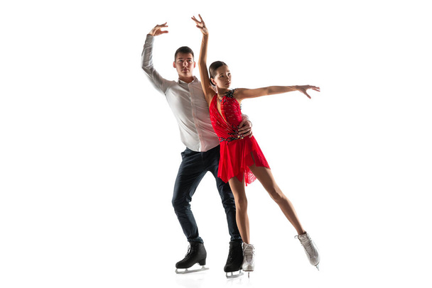 Duo figure skating isolated on white studio backgound with copyspace - Foto, imagen