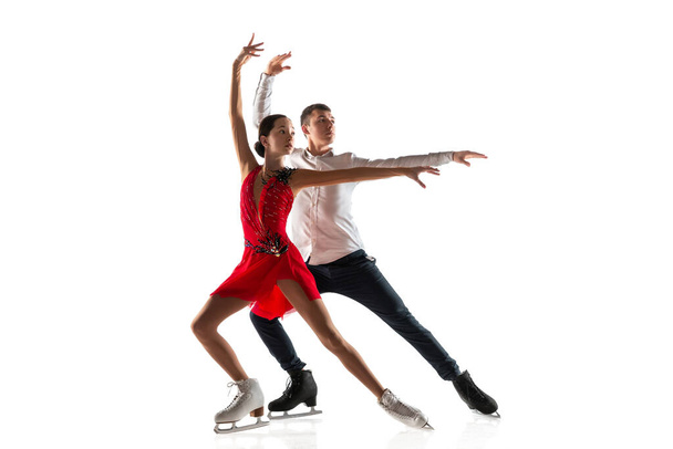 Duo figure skating isolated on white studio backgound with copyspace - Fotó, kép