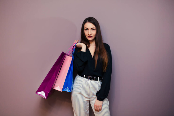 beautiful young girl goes shopping. - 写真・画像