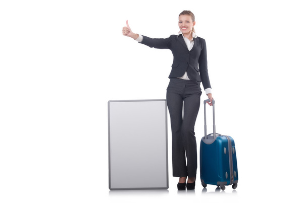 白いスーツケースで休暇の準備をする女性 - 写真・画像