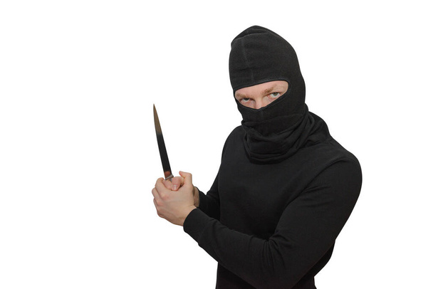 man in a balaclava with a knife portrait isolated on a white background  - Fotó, kép