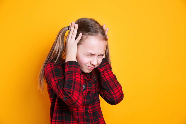 Annoyed stressed girl cover ears feel hurt ear ache pain - Foto, Imagen