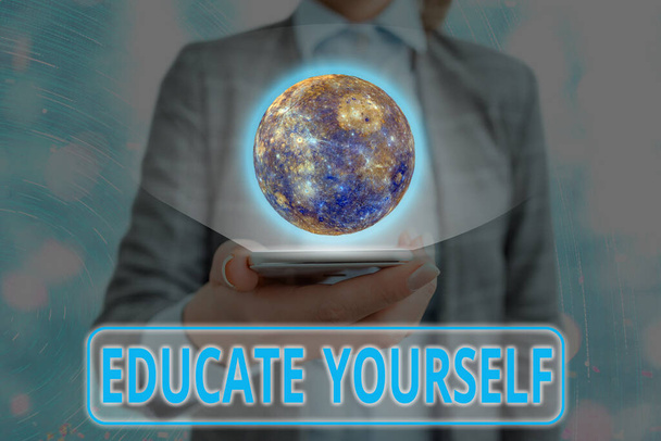 Writing note showing Educate Yourself. Business photo showcasing prepare oneself or someone in a particular area or subject Elements of this image furnished by NASA. - Photo, Image