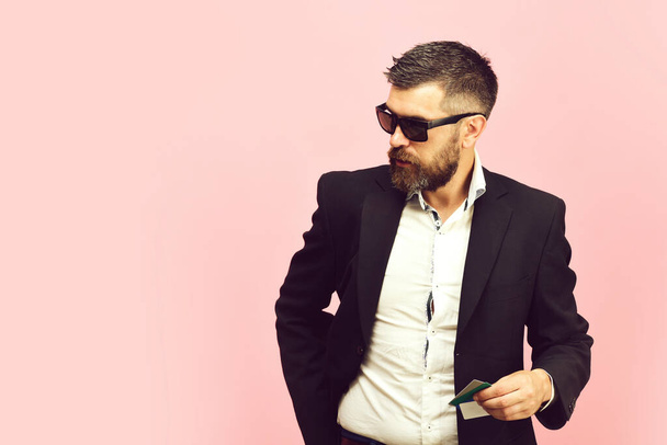 Businessman with cards, copy space. Man in suit with beard - Photo, image