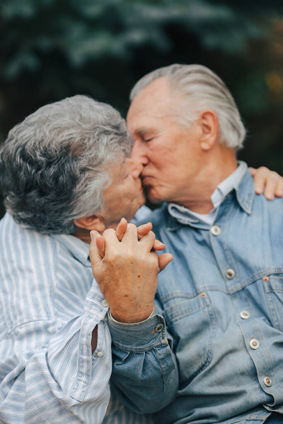 Beautiful old couple spent time together in a park - Photo, image
