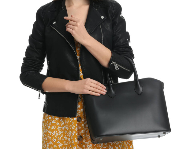 Young woman with stylish bag on white background, closeup - Foto, Imagem