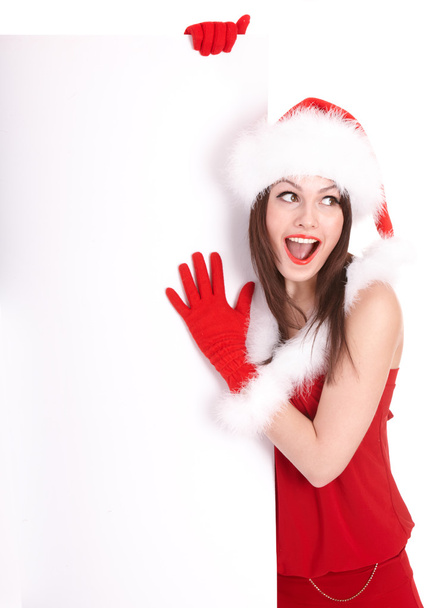サンタの帽子をバナーでクリスマスの女の子. - 写真・画像