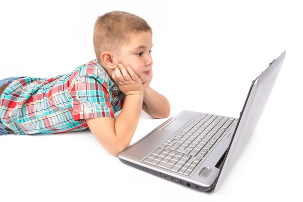 Little boy working on laptop - Φωτογραφία, εικόνα