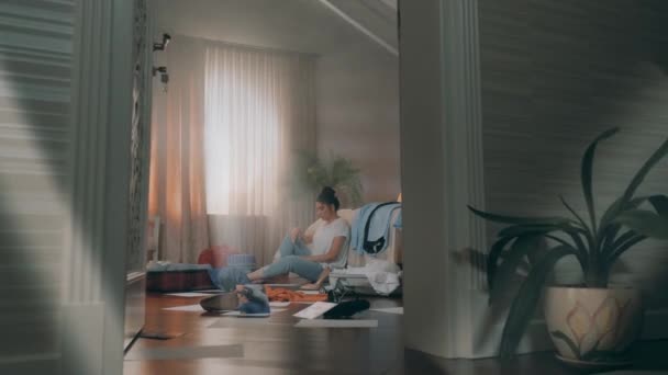 sad girl suffer sitting in bedroom room - Filmati, video