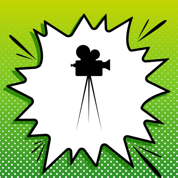 Retro video recording camera on tripod sign. Black Icon on white popart Splash at green background with white spots. - Vector, Image