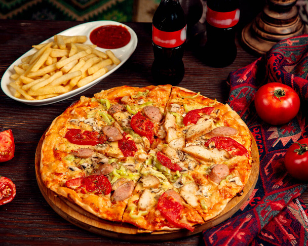 mixed pizza and fries with ketchup - Photo, Image