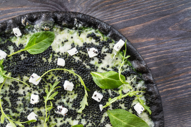 pizza with black caviar, top view - Photo, image