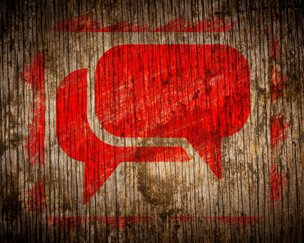 Red Speech Bubble Icon on Wood. - Photo, Image