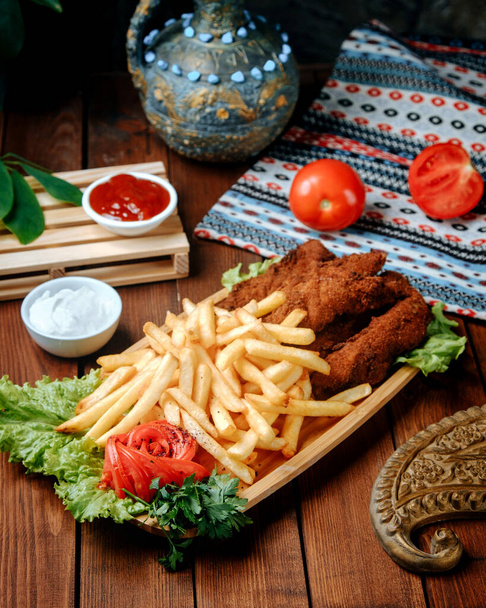 fried chicken nuggets with french fries on the table - Fotografie, Obrázek
