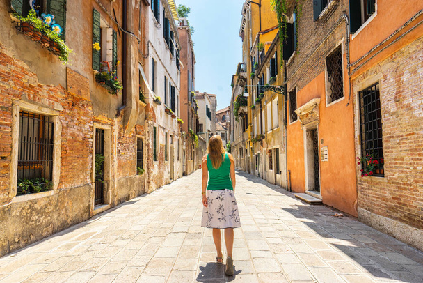 Woman walking on the street. Italy. - Valokuva, kuva