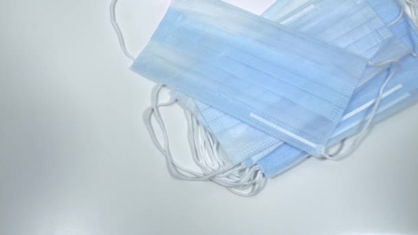Surgical Masks Picked up by Hands in Latex Medical Gloves - Imágenes, Vídeo