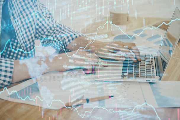 Multi exposure of stock market chart with man working on computer on background. Concept of financial analysis. - Photo, image