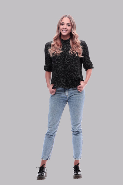 in full growth. modern young woman in jeans - Фото, зображення