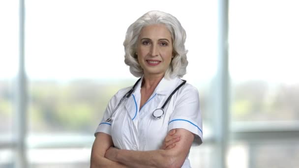 Portrait of an old cheerful female doctor. - Filmagem, Vídeo