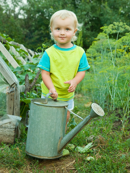 Baby boy with watering pot - Fotoğraf, Görsel