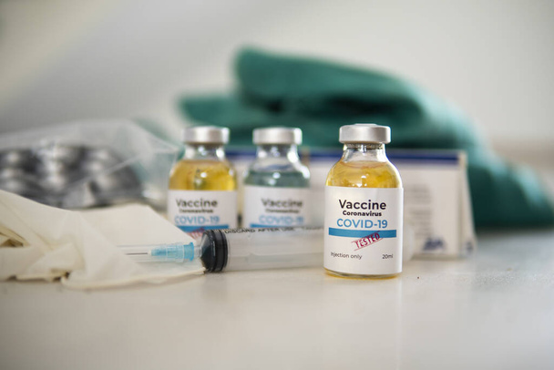 Vaccine and syringe injection. It use for prevention,immunization and treatment from corona virus infection(novel coronavirus disease 2019,COVID-19,nCoV 2019). Medicine infectious concept. - Fotografie, Obrázek
