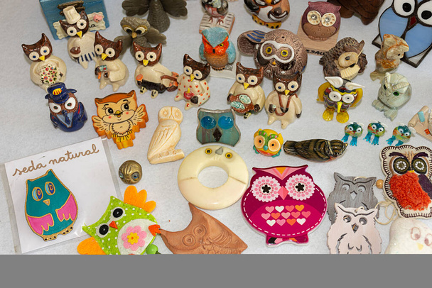 Owl collection. Different materials, shapes, colors and sizes. Souvenirs from the world. - Photo, Image