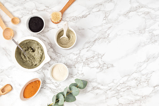 Homemade clay facial mask. Zero waste eco friendly diy beauty products ingredients on light background, flat lay, top view - Foto, Bild