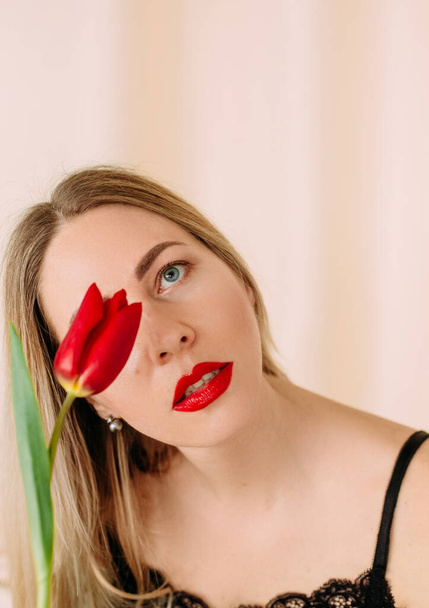 girl flowers beauty cosmetics body skin care freshness aroma floral red tulip - Valokuva, kuva