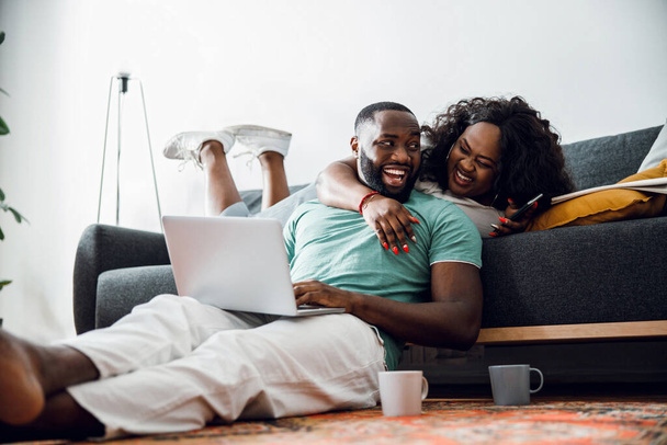 Handsome man laughing with his beloved woman stock photo - Φωτογραφία, εικόνα