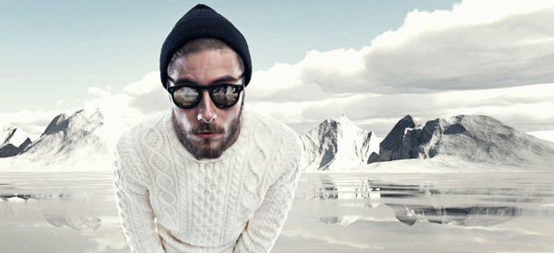 Cool man with beard in winter fashion. Wearing white woolen swea - Photo, Image