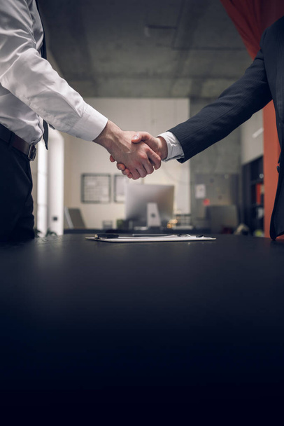 Cropped photo of businessmen shaking hands after meeting - Φωτογραφία, εικόνα