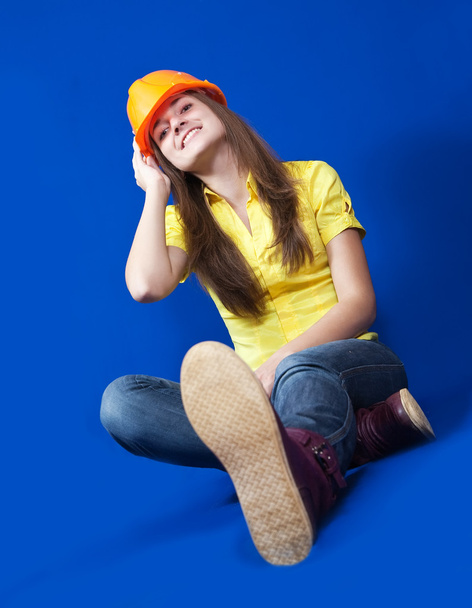 Girl in hard hat - Foto, imagen