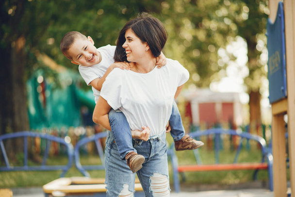 Mother with little child on a playground - Photo, Image