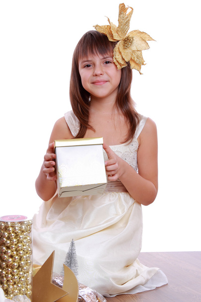 Girl with Christmas tree and gifts - 写真・画像