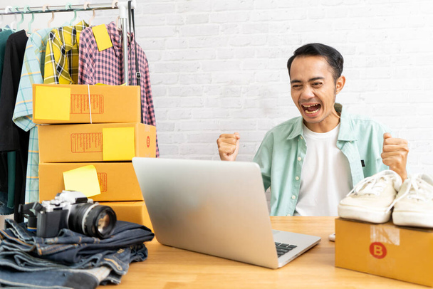 Asian man working at home office success concept, Selling online start up small business owner e-commerce - 写真・画像