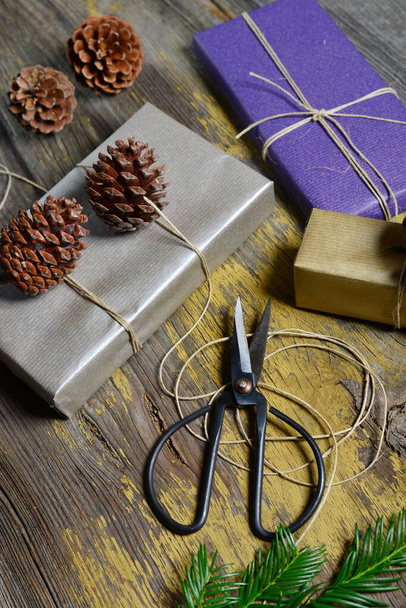 Stylish & Vintage christmas gifts box presents on the old wooden table - Foto, immagini