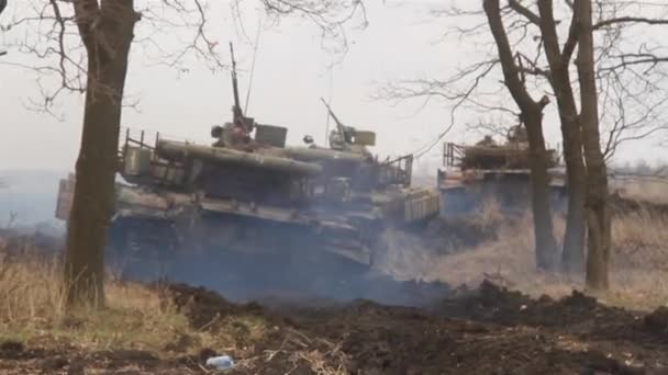 Tank exercises at the training ground. Shots of tanks in motion. - Footage, Video